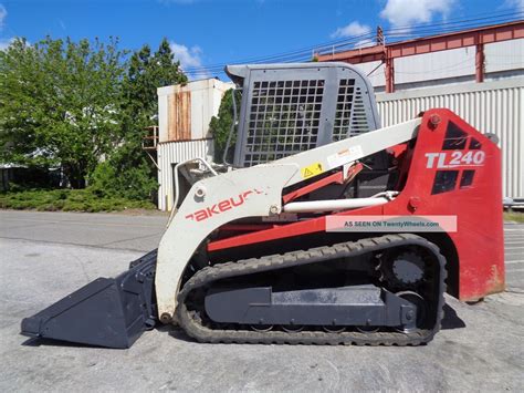 tl240 skid steer